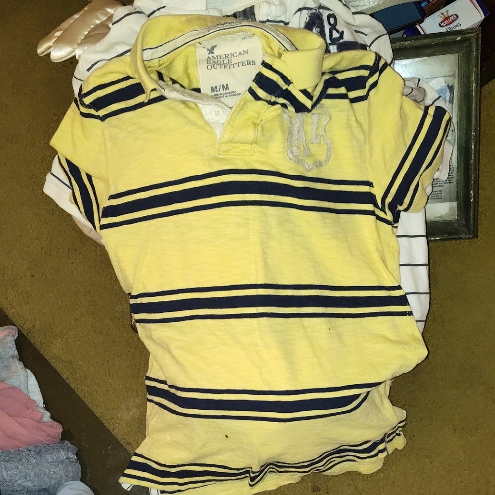 American Eagle Outfitters Yellow Polo Shirt with Black Stripes and Casual Style